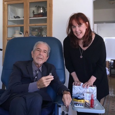 I wondered if you had seen these pictures Geoffrey of Leonard in the blue medical chair with perfumer Mandy Aftel - taken 11th August.  He looks so frail bless him ..<br />June x